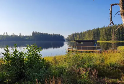 Enjoy the view and a cooling dip from the sauna raft in Algustorpasjön